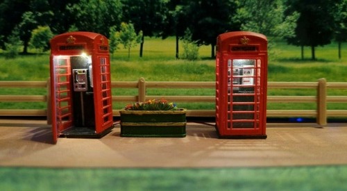 Two telephone boxes with - telephone,